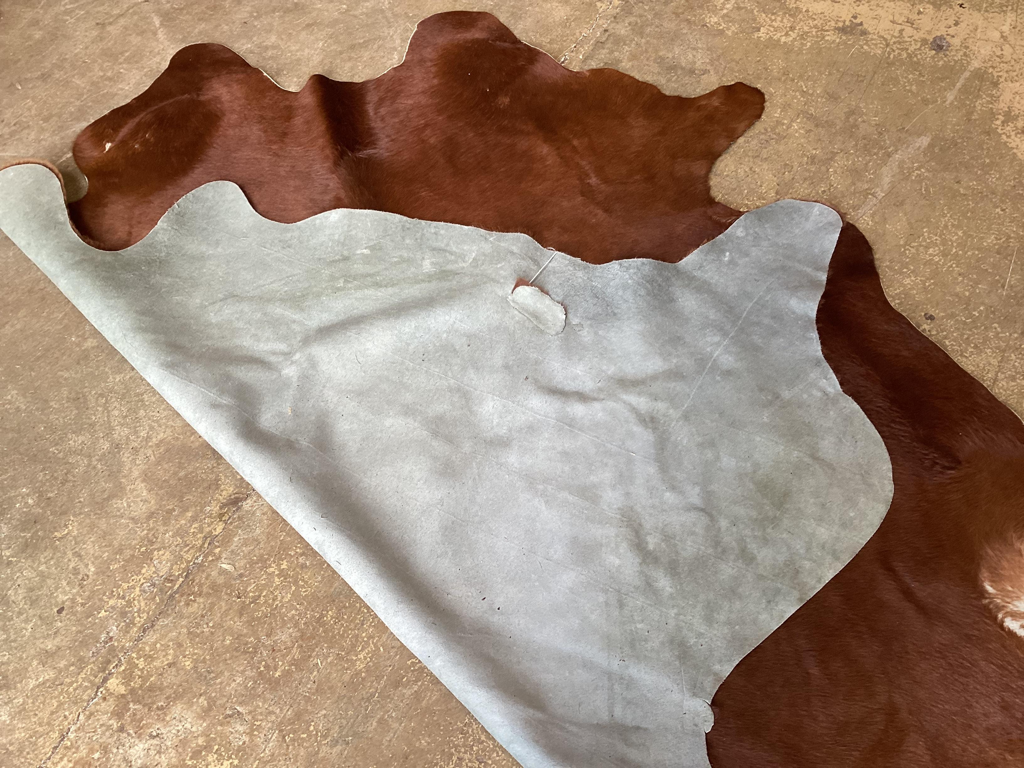 A cow skin rug, approx. 180 x 160cm